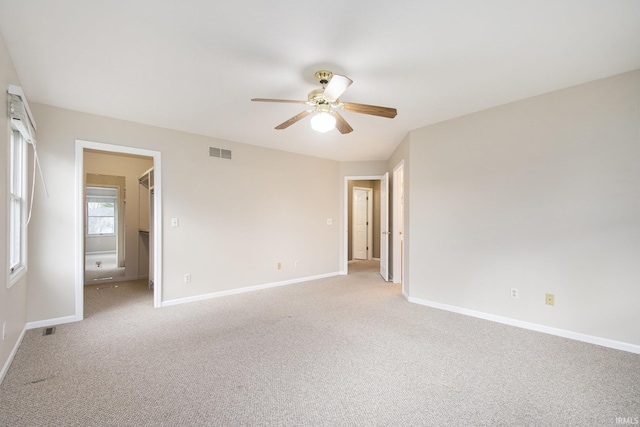 22486 Fireside Dr, Goshen, IN 46528 - unfurnished bedroom featuring light carpet, baseboards, visible vents, and a spacious closet