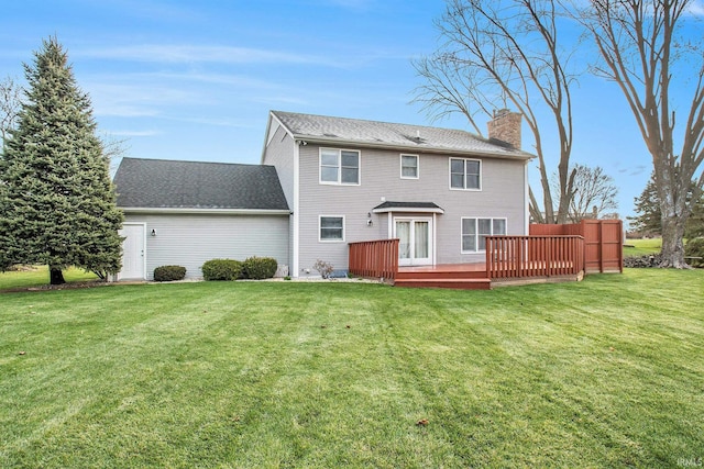 22486 Fireside Dr, Goshen, IN 46528 - back of house featuring a wooden deck, a lawn, a shingled roof, and a chimney