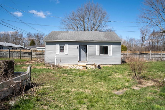 view of outbuilding featuring fence