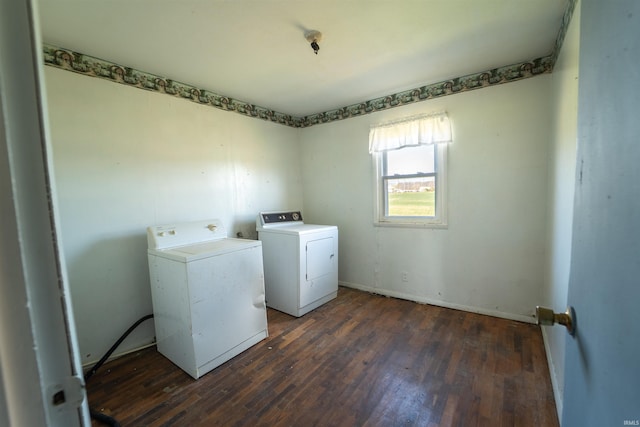 washroom with washing machine and clothes dryer, laundry area, dark wood-style floors, and baseboards
