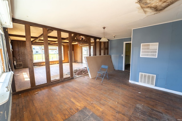 interior space featuring wood-type flooring and visible vents