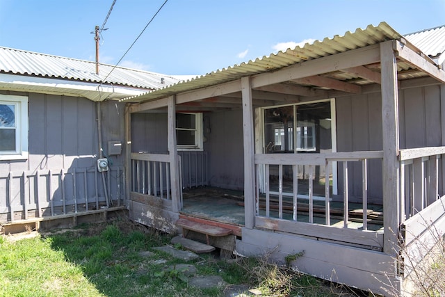 view of property exterior featuring metal roof