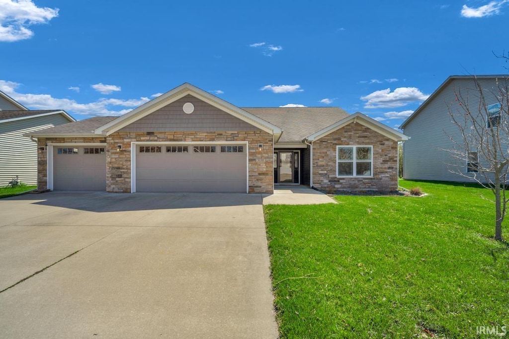 3130 Crooked Stick Dr, Kokomo, IN 46902 - ranch-style house with an attached garage, driveway, stone siding, and a front yard