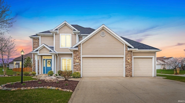 view of front of house featuring stone siding, a shingled roof, driveway, and a garage