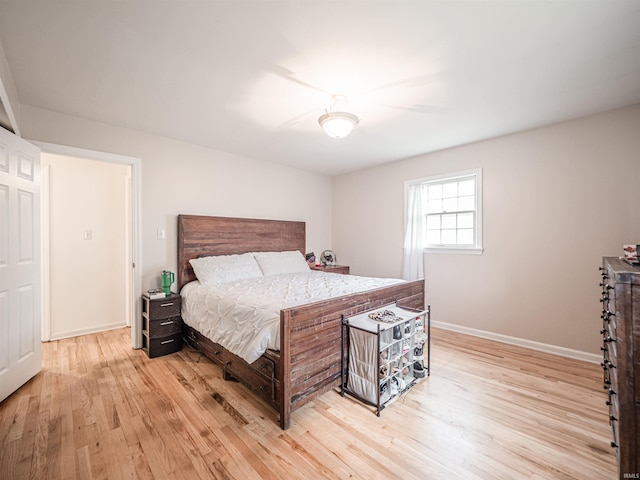 8013 Larch Ln, Evansville, IN 47710 - bedroom with baseboards and light wood finished floors