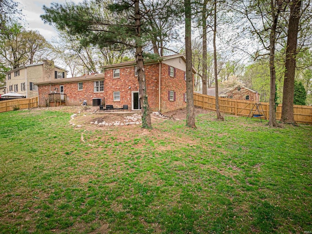 8013 Larch Ln, Evansville, IN 47710 - view of yard featuring a fenced backyard, central AC, and a patio