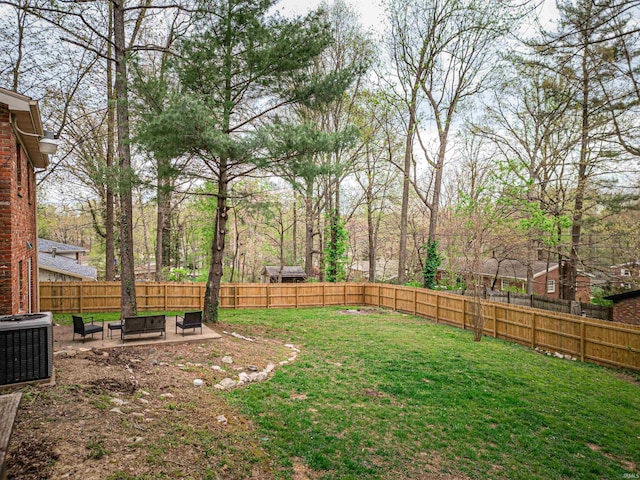 8013 Larch Ln, Evansville, IN 47710 - view of yard with a patio area, a fenced backyard, and central AC