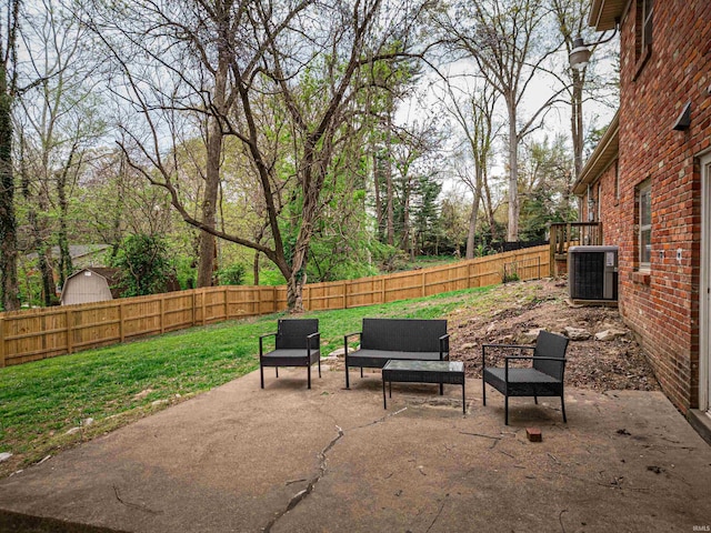 8013 Larch Ln, Evansville, IN 47710 - view of patio with a fenced backyard, central AC unit, and an outdoor living space
