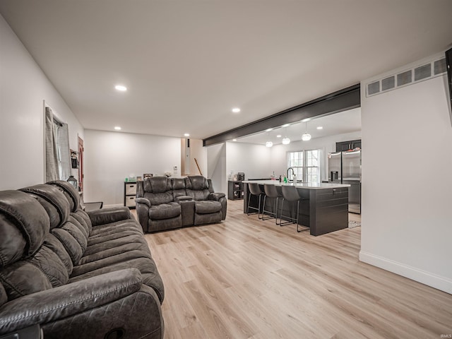 8013 Larch Ln, Evansville, IN 47710 - living area featuring visible vents, recessed lighting, and light wood-style floors