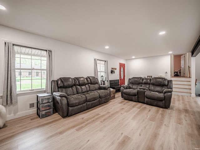 8013 Larch Ln, Evansville, IN 47710 - living area with light wood finished floors, baseboards, visible vents, recessed lighting, and stairs