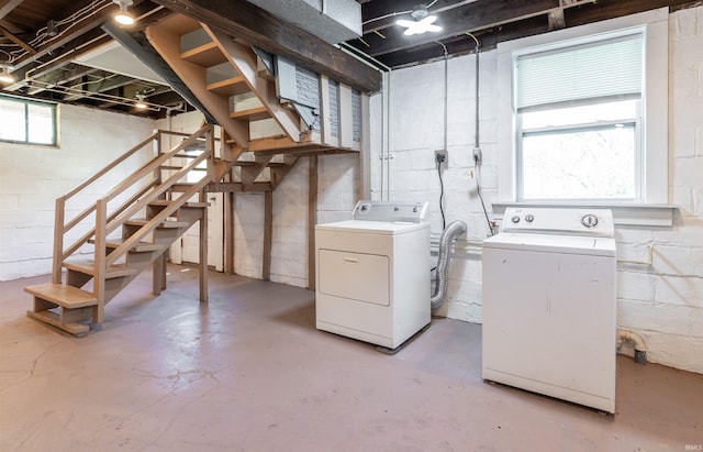 below grade area featuring washer and dryer and stairs