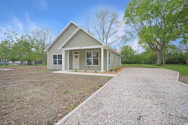 bungalow-style home with driveway
