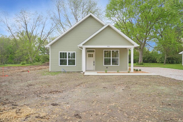 bungalow-style home featuring covered porch