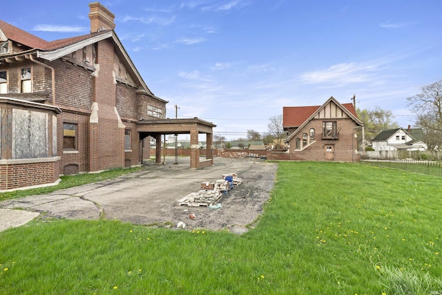 view of yard featuring fence and a patio area