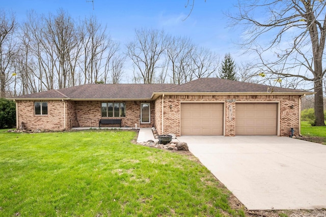 single story home with driveway, a shingled roof, an attached garage, a front yard, and brick siding