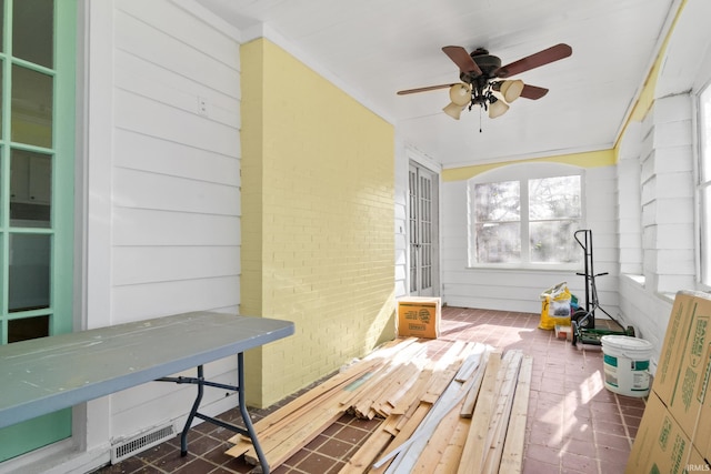 sunroom / solarium featuring visible vents