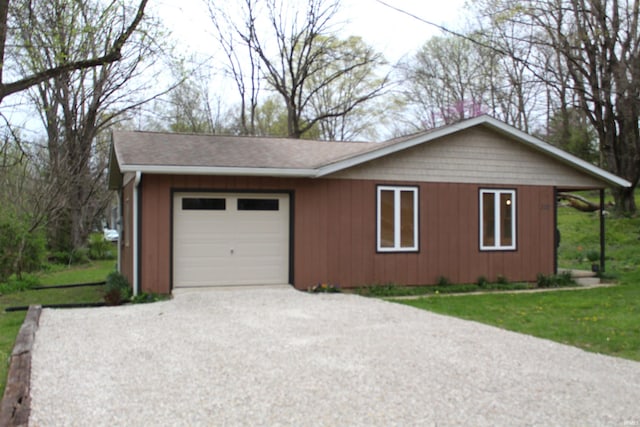 320 W Ritter St, Ellettsville, IN 47429 - view of front facade featuring an attached garage and driveway