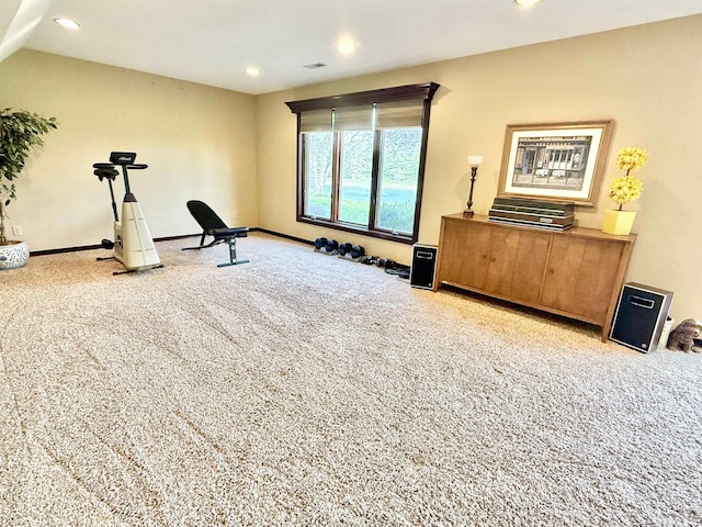exercise area with recessed lighting, carpet, and baseboards