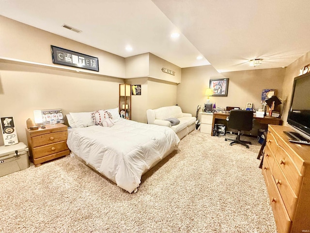 carpeted bedroom featuring visible vents and recessed lighting