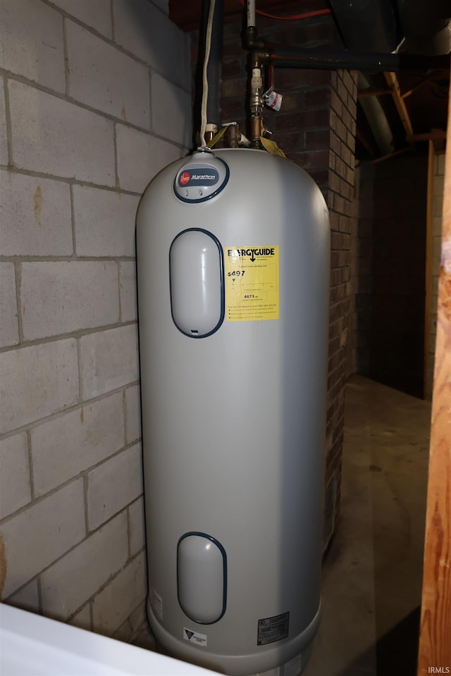 12176 E 350 N, Loogootee, IN 47553 - utility room with electric water heater