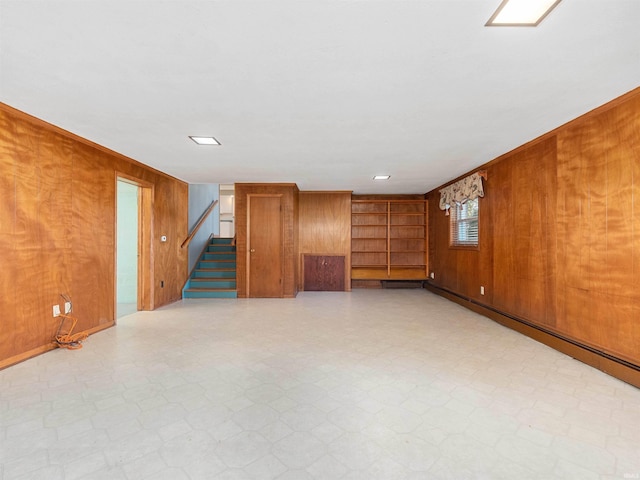 2801 W 700 S, Claypool, IN 46510 - below grade area featuring wooden walls, stairs, and light floors