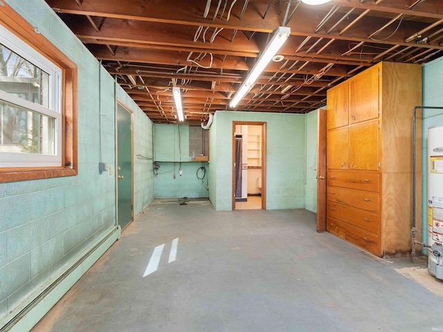 2801 W 700 S, Claypool, IN 46510 - below grade area featuring a baseboard heating unit and concrete block wall