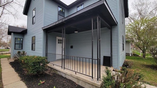 doorway to property featuring a porch