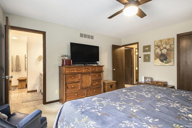 bedroom featuring visible vents, a ceiling fan, light carpet, connected bathroom, and baseboards