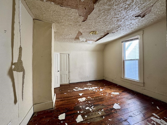 313 E S B St, Gas City, IN 46933 - empty room featuring lofted ceiling and hardwood / wood-style flooring