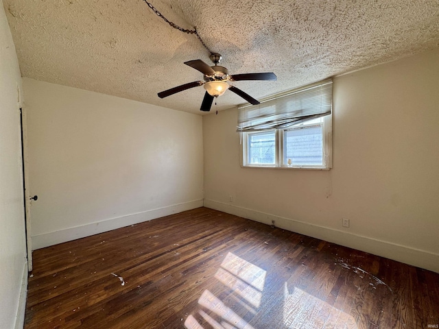 313 E S B St, Gas City, IN 46933 - empty room featuring hardwood / wood-style floors, a ceiling fan, baseboards, and a textured ceiling
