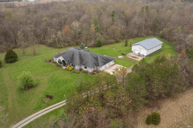 bird's eye view featuring a view of trees