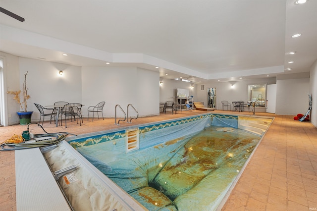 pool featuring a hot tub