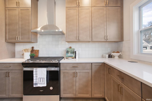 12793 Brick Rd Lot 4, Granger, IN 46530 - kitchen with light countertops, gas stove, backsplash, and wall chimney range hood