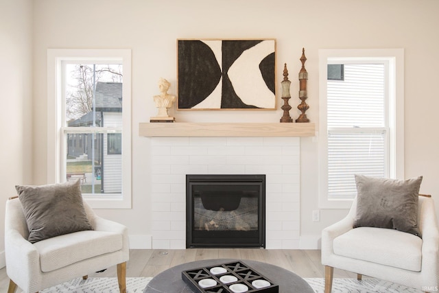 12793 Brick Rd Lot 4, Granger, IN 46530 - living area with wood finished floors and a tiled fireplace
