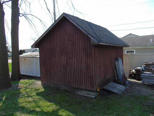 view of outdoor structure featuring an outdoor structure and fence