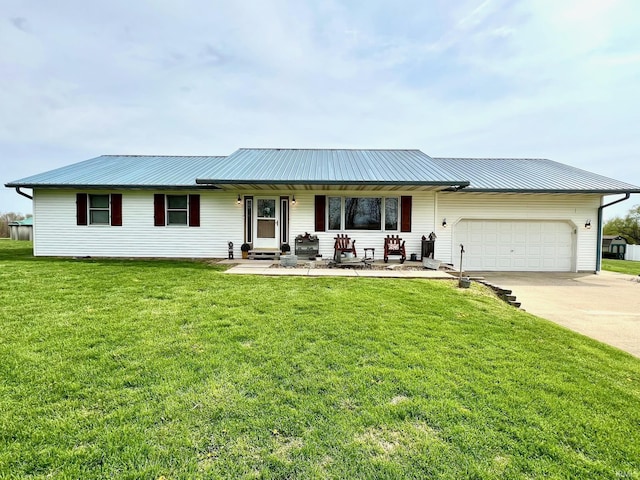 ranch-style house featuring a garage, concrete driveway, a front lawn, a porch, and metal roof