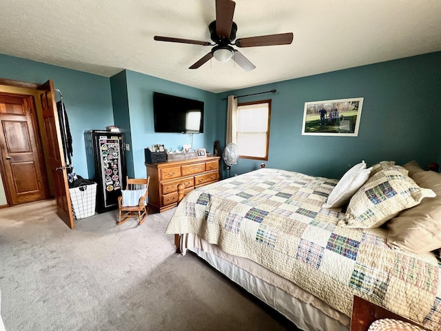 carpeted bedroom with a ceiling fan