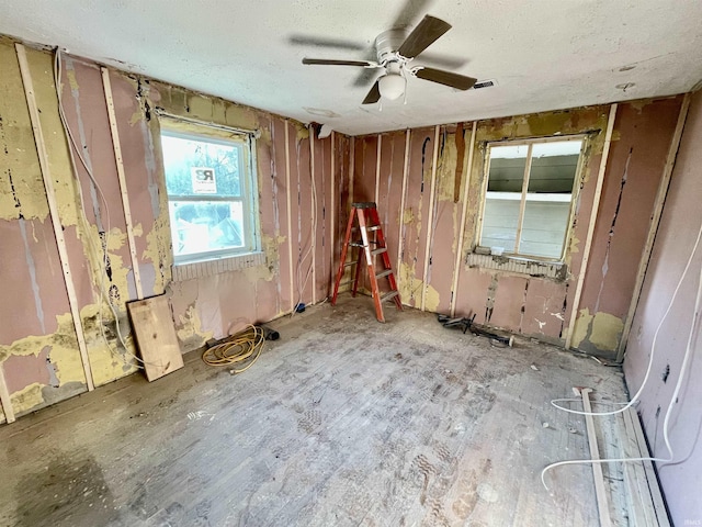 spare room with a ceiling fan