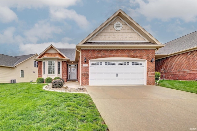 view of front of house with an attached garage, driveway, and brick siding