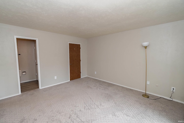 4829 Kintyre Dr, South Bend, IN 46614 - spare room with baseboards, carpet floors, and a textured ceiling