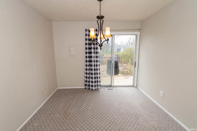 4829 Kintyre Dr, South Bend, IN 46614 - unfurnished room with visible vents, baseboards, a chandelier, and carpet flooring