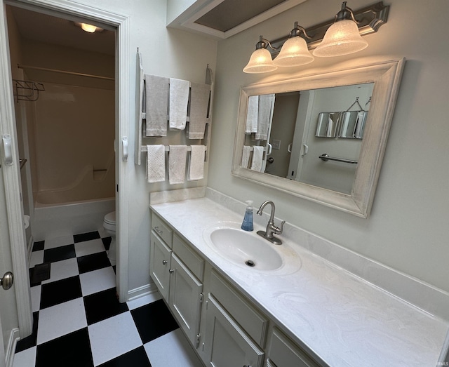 full bath with toilet, vanity, tile patterned floors, and shower / bathing tub combination