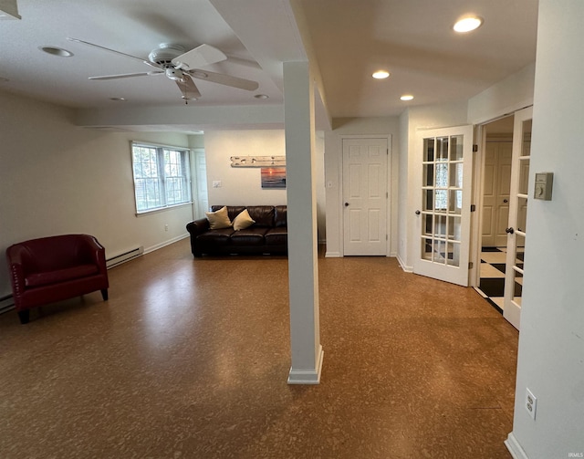 corridor featuring baseboard heating, baseboards, french doors, and recessed lighting