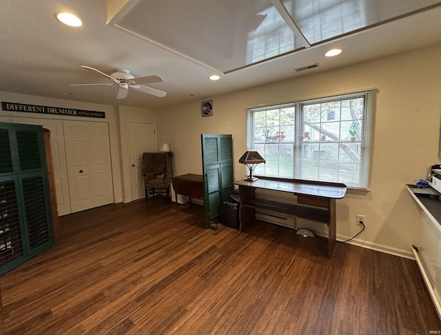 misc room featuring recessed lighting, wood finished floors, and visible vents
