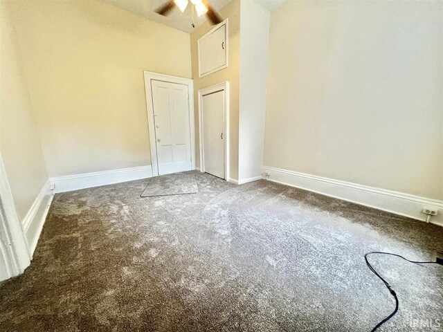 1926 W Indiana St, Evansville, IN 47712 - carpeted spare room with ceiling fan, baseboards, and lofted ceiling