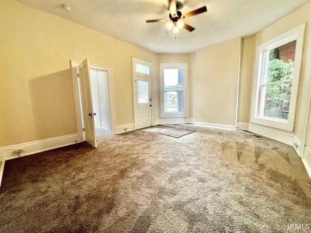 1926 W Indiana St, Evansville, IN 47712 - spare room with carpet flooring, baseboards, and ceiling fan