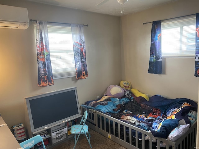 carpeted bedroom with a wall mounted air conditioner