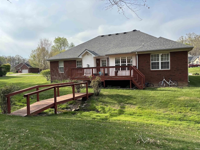 1807 Sterling Oaks Dr, Sellersburg, IN 47172 - back of property with a shingled roof, brick siding, a yard, and a deck