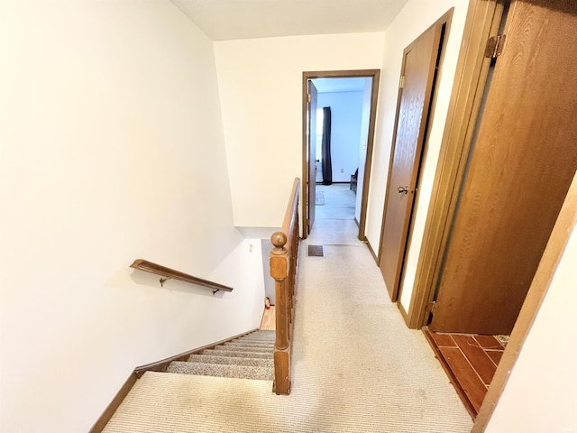 2421 S Brittany Ln, Bloomington, IN 47401 - hallway featuring baseboards and visible vents