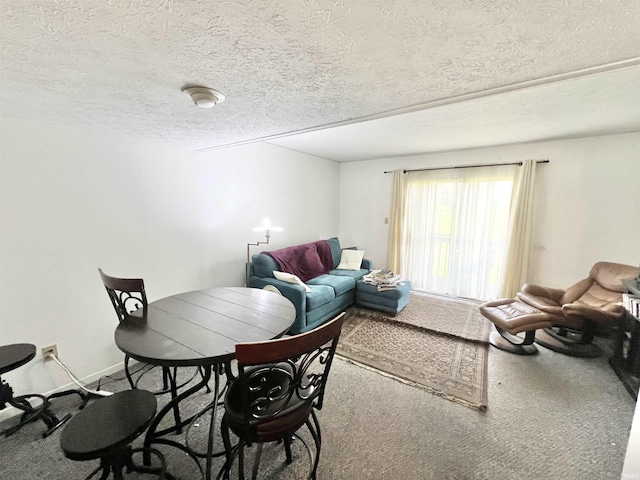 2421 S Brittany Ln, Bloomington, IN 47401 - dining space featuring carpet flooring and a textured ceiling